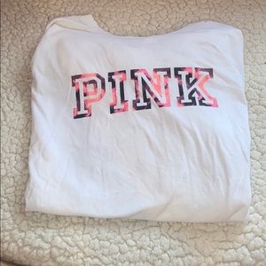 Good condition white long sleeve with pink logo
